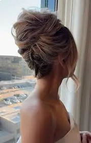Messy Bun with Soft Strands 1