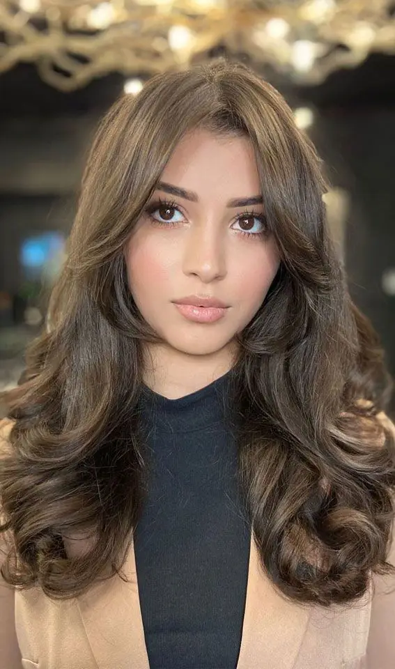 Butterfly Haircut with Face-Framing Layers